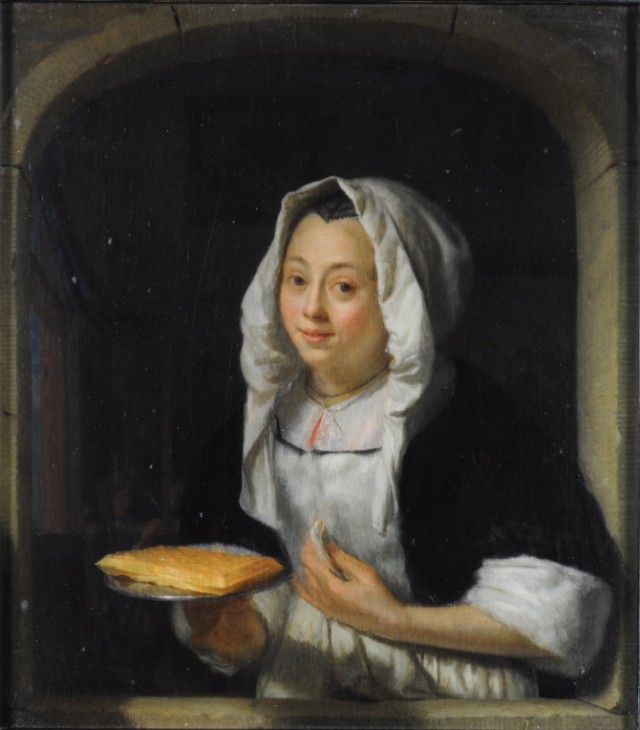 Schalcken-Jonge-vrouw-die-een-wafel-aanbiedt